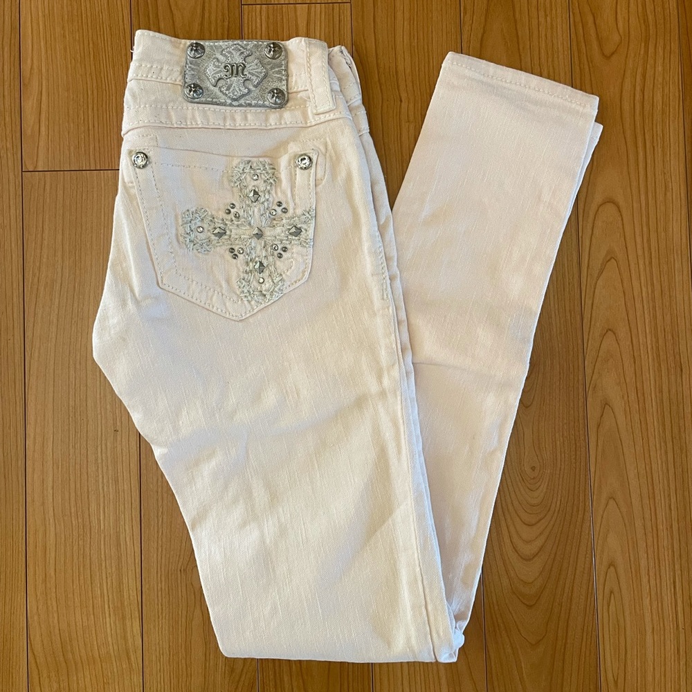 Light Pink Miss Me Skinny Jeans. Size 25